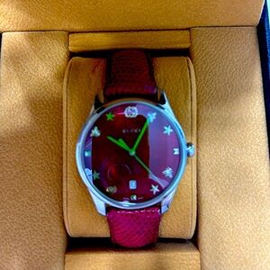 Women’s Gucci watch.